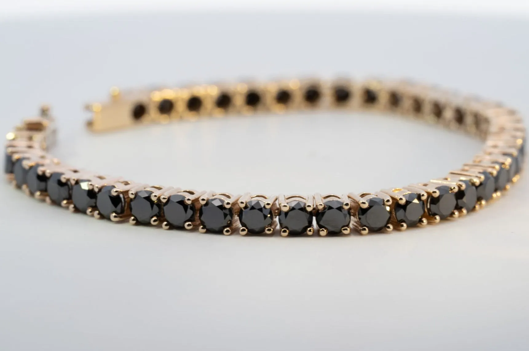 "Valentine's Sparkle: 10K Gold Black Diamond Tennis Bracelet"