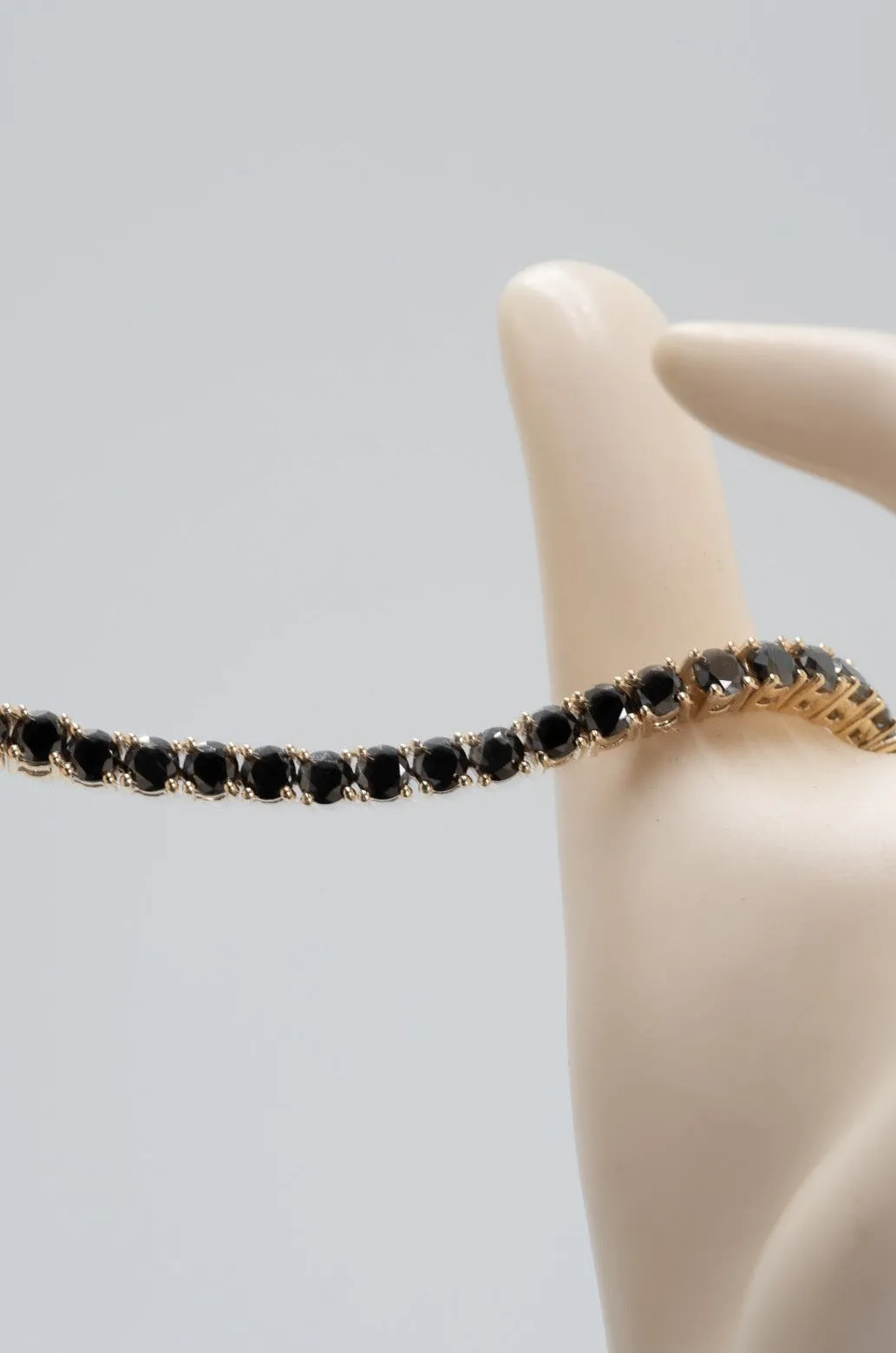 "Valentine's Sparkle: 10K Gold Black Diamond Tennis Bracelet"