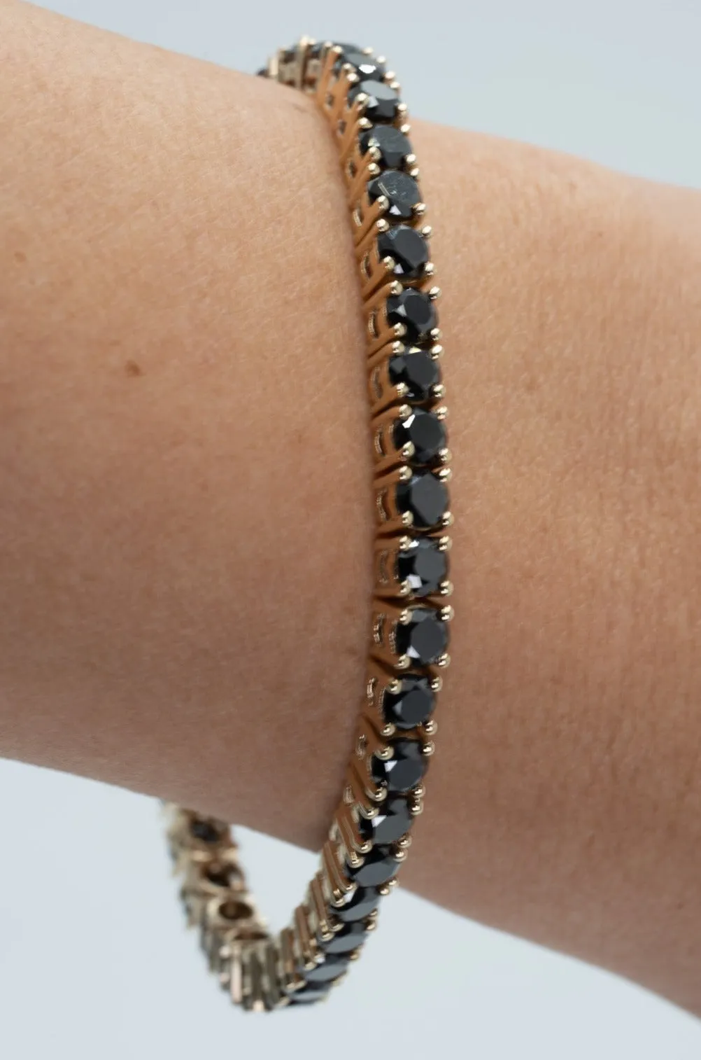 "Valentine's Sparkle: 10K Gold Black Diamond Tennis Bracelet"