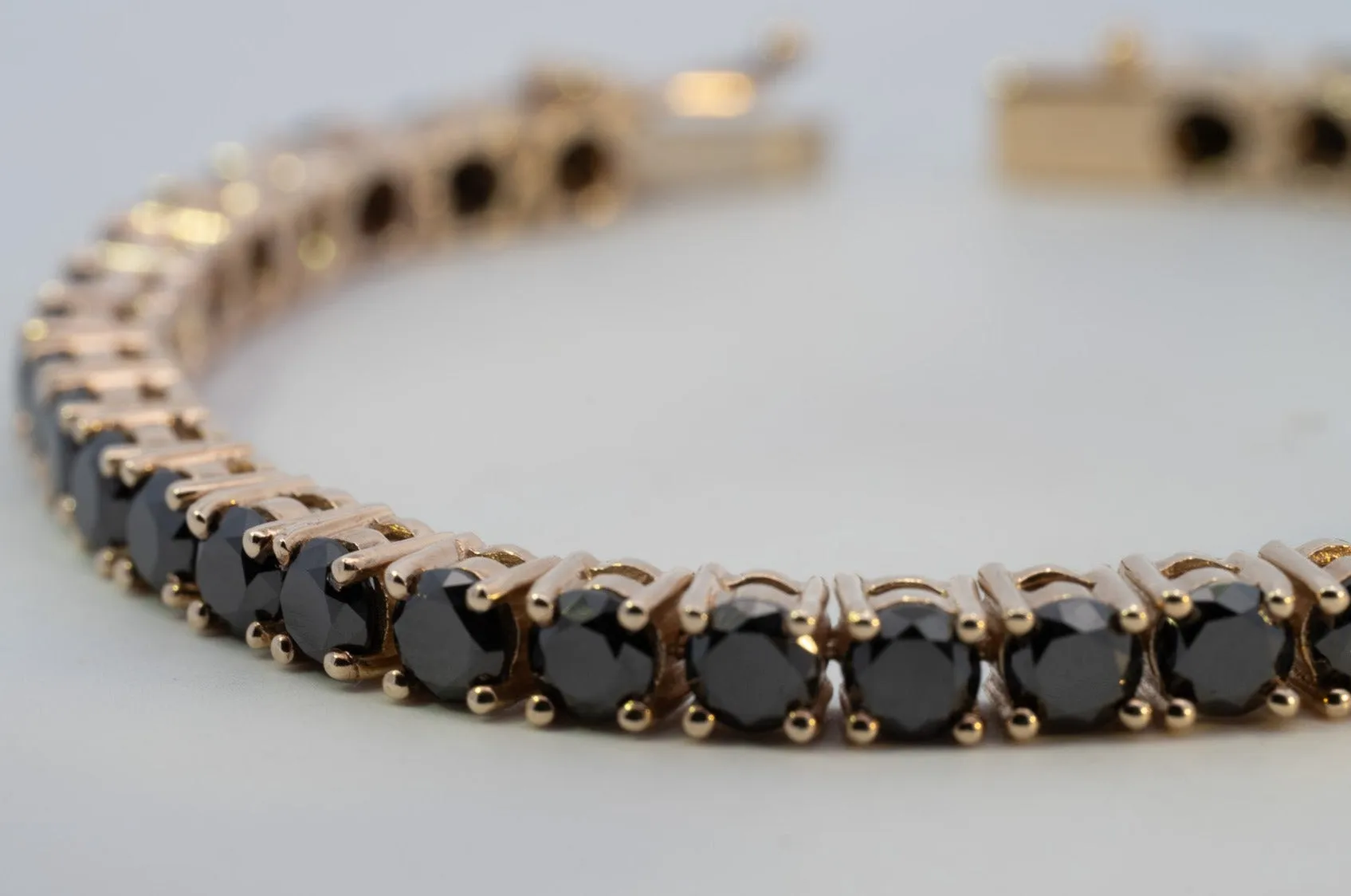 "Valentine's Sparkle: 10K Gold Black Diamond Tennis Bracelet"