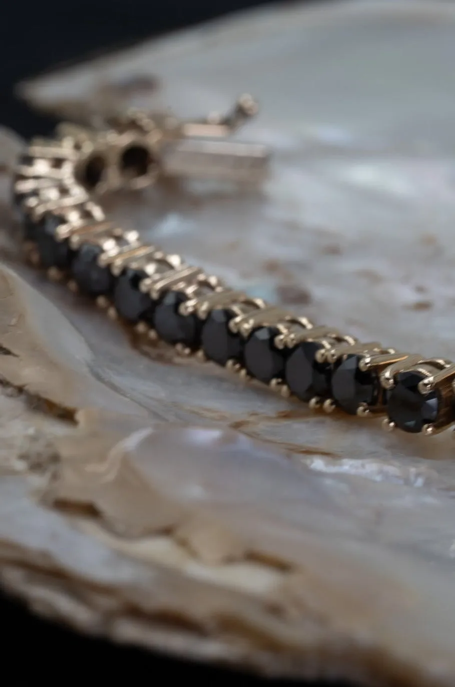 "Valentine's Sparkle: 10K Gold Black Diamond Tennis Bracelet"